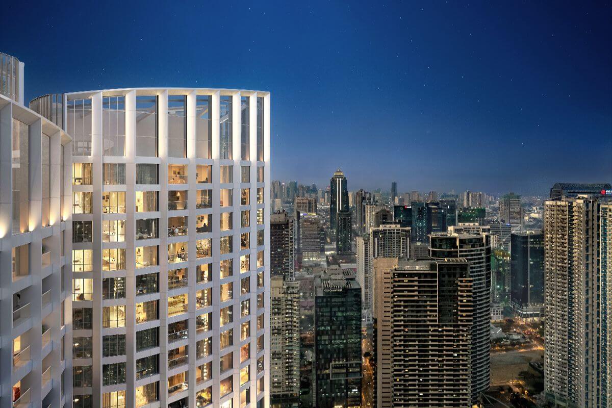 Aurelia Residences tower with nighttime skyline views in BGC
