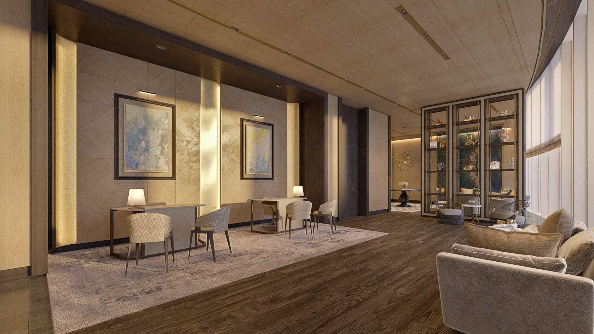 Elegant luxury condominium lounge with warm lighting, seating areas, artwork, and refined interior finishes