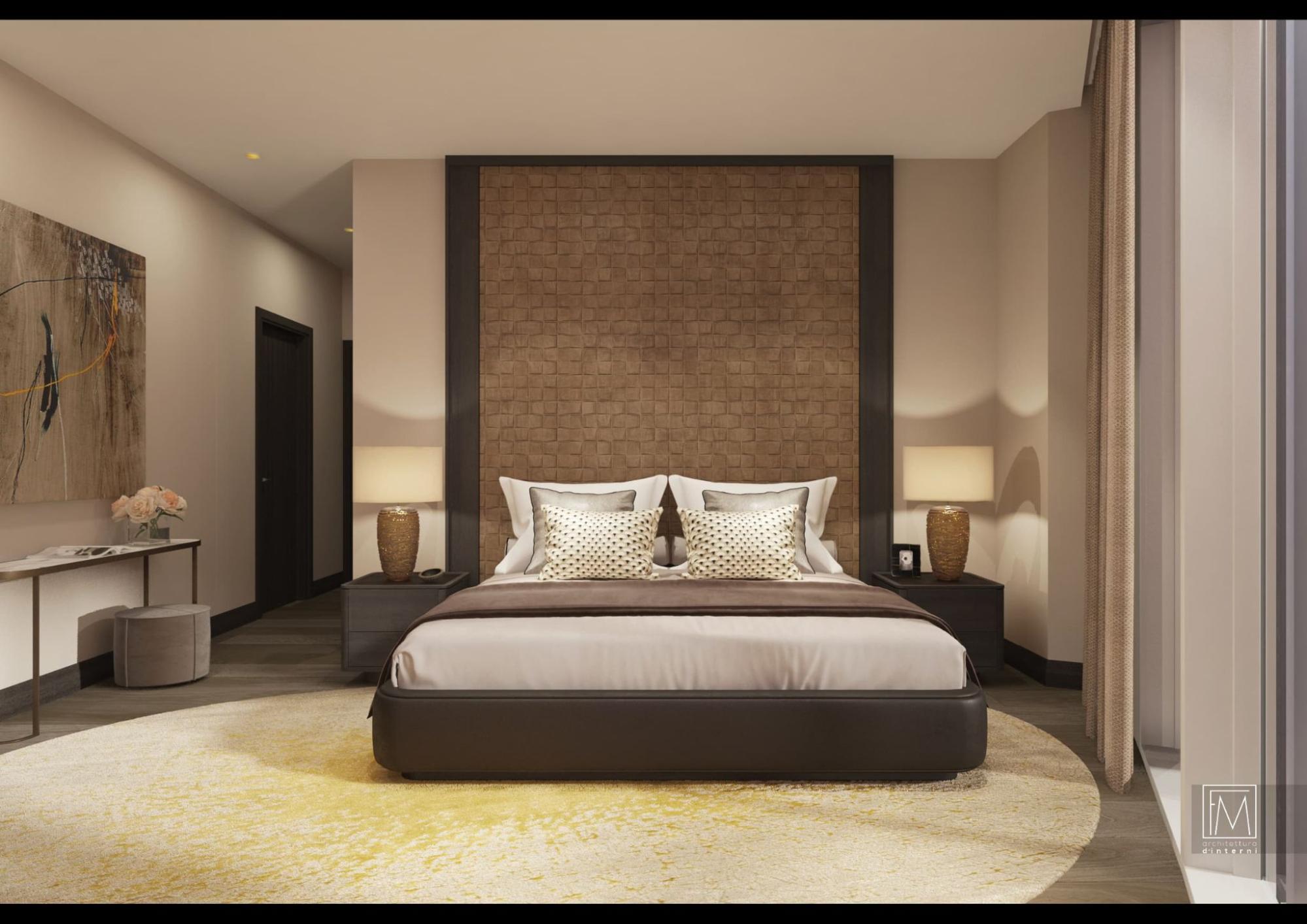 Spacious luxury bedroom with textured wall feature, warm lighting, and refined neutral interiors