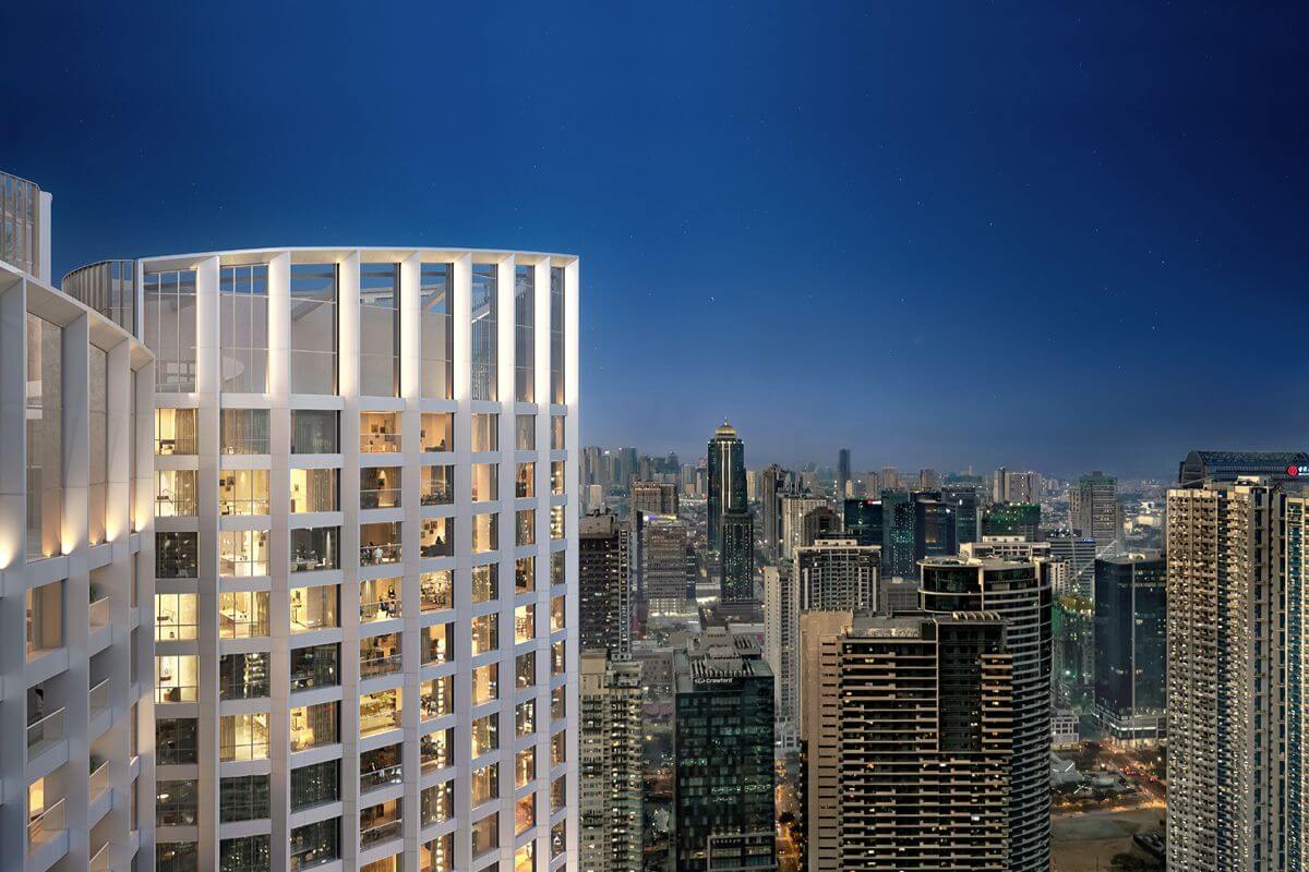 Aurelia Residences illuminated at night with the Bonifacio Global City skyline in the background